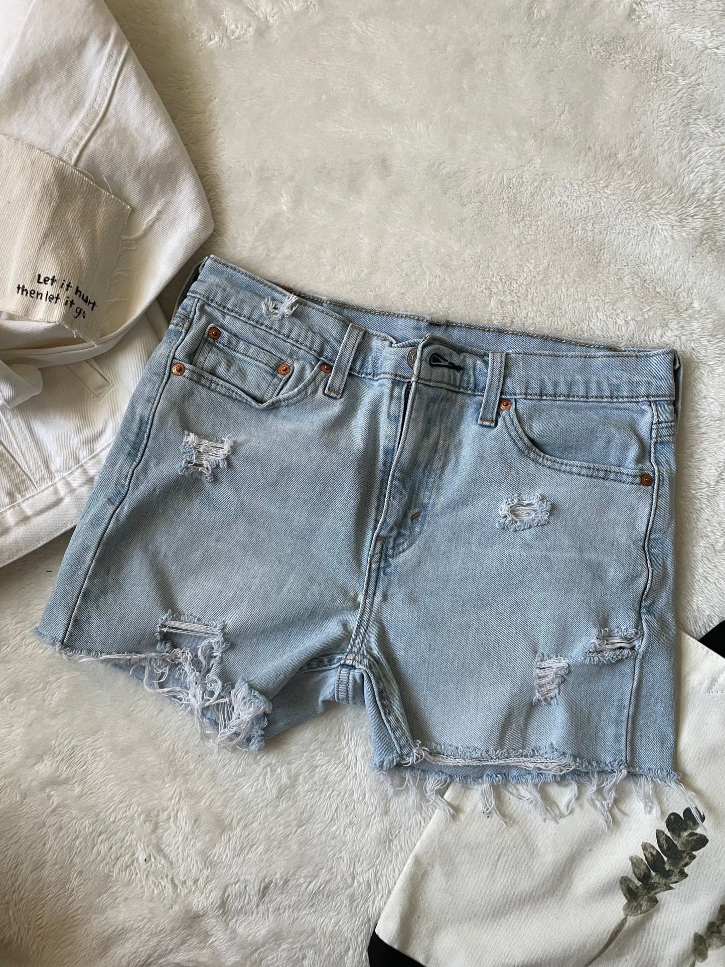 Levi’s light washed Upcycled 3" shorts. Size 30.
