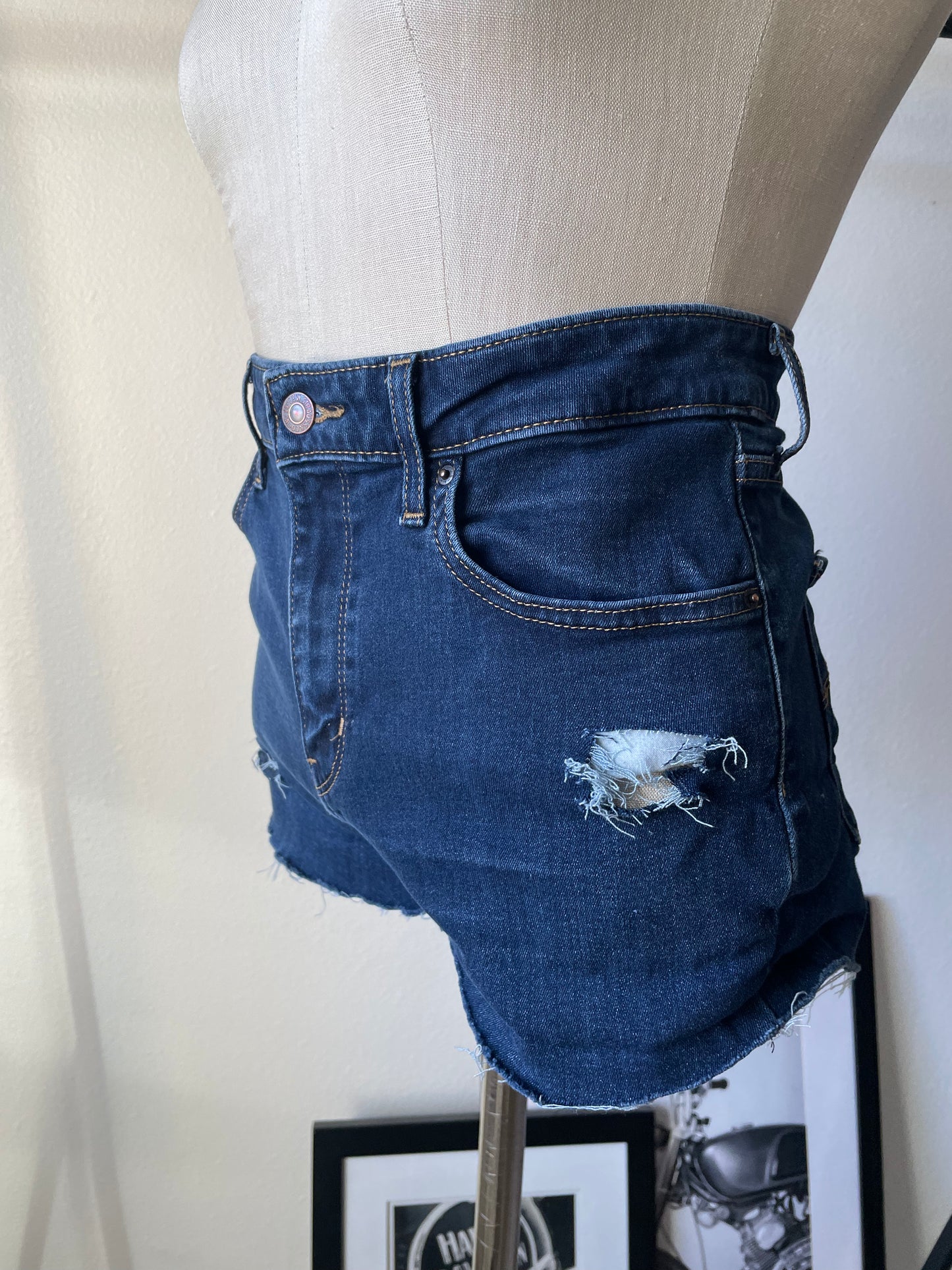 Levi’s dark blue high rise Upcycled shorts.