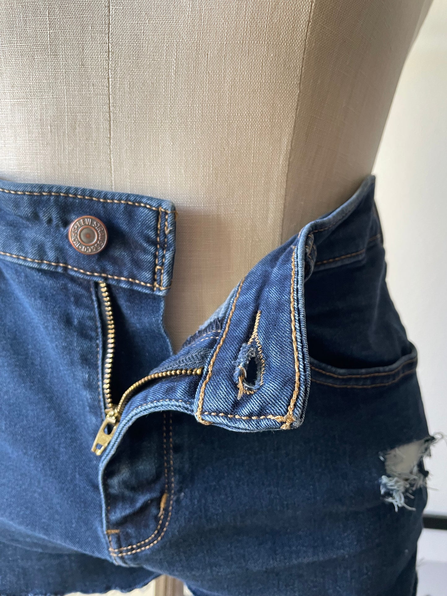 Levi’s dark blue high rise Upcycled shorts.