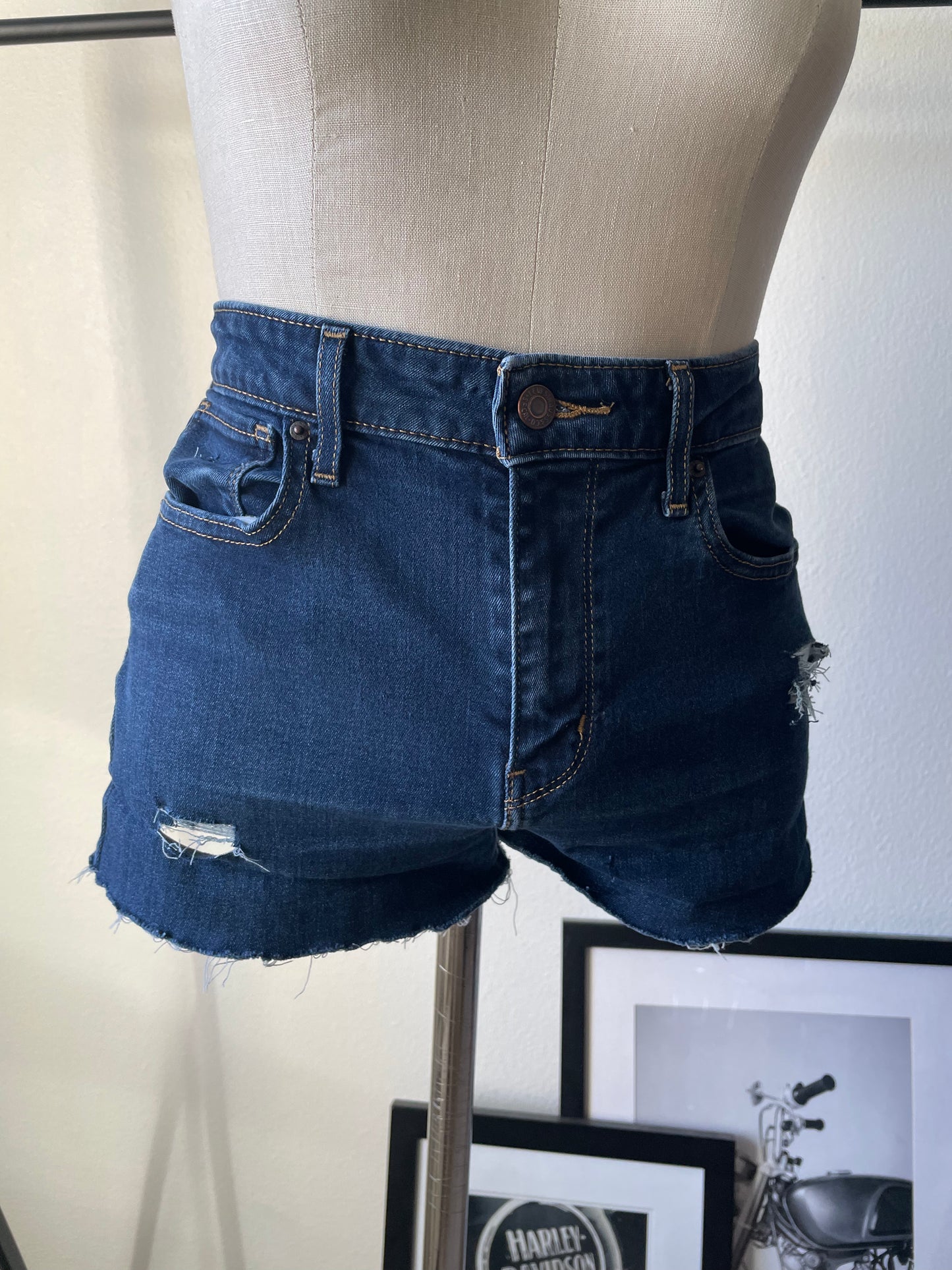 Levi’s dark blue high rise Upcycled shorts.