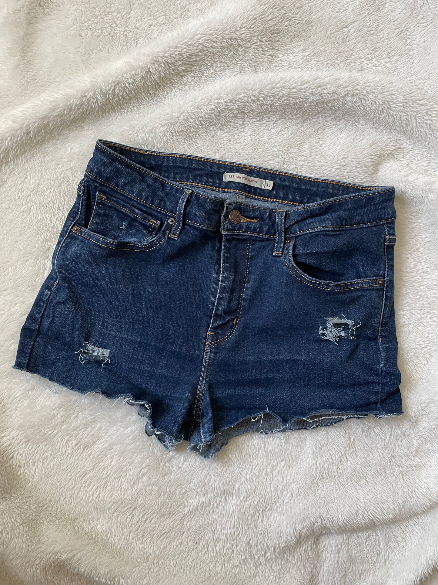 Levi’s dark blue high rise Upcycled shorts.