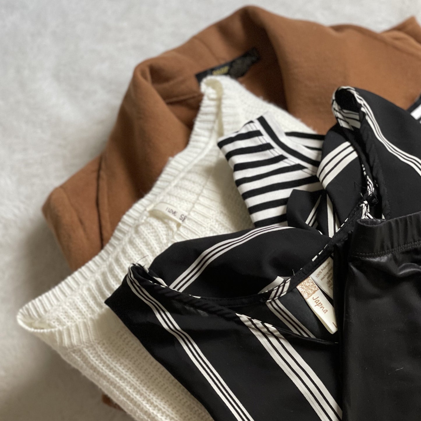 Curated Capsule. Black and Tan. Size medium. 5 items.