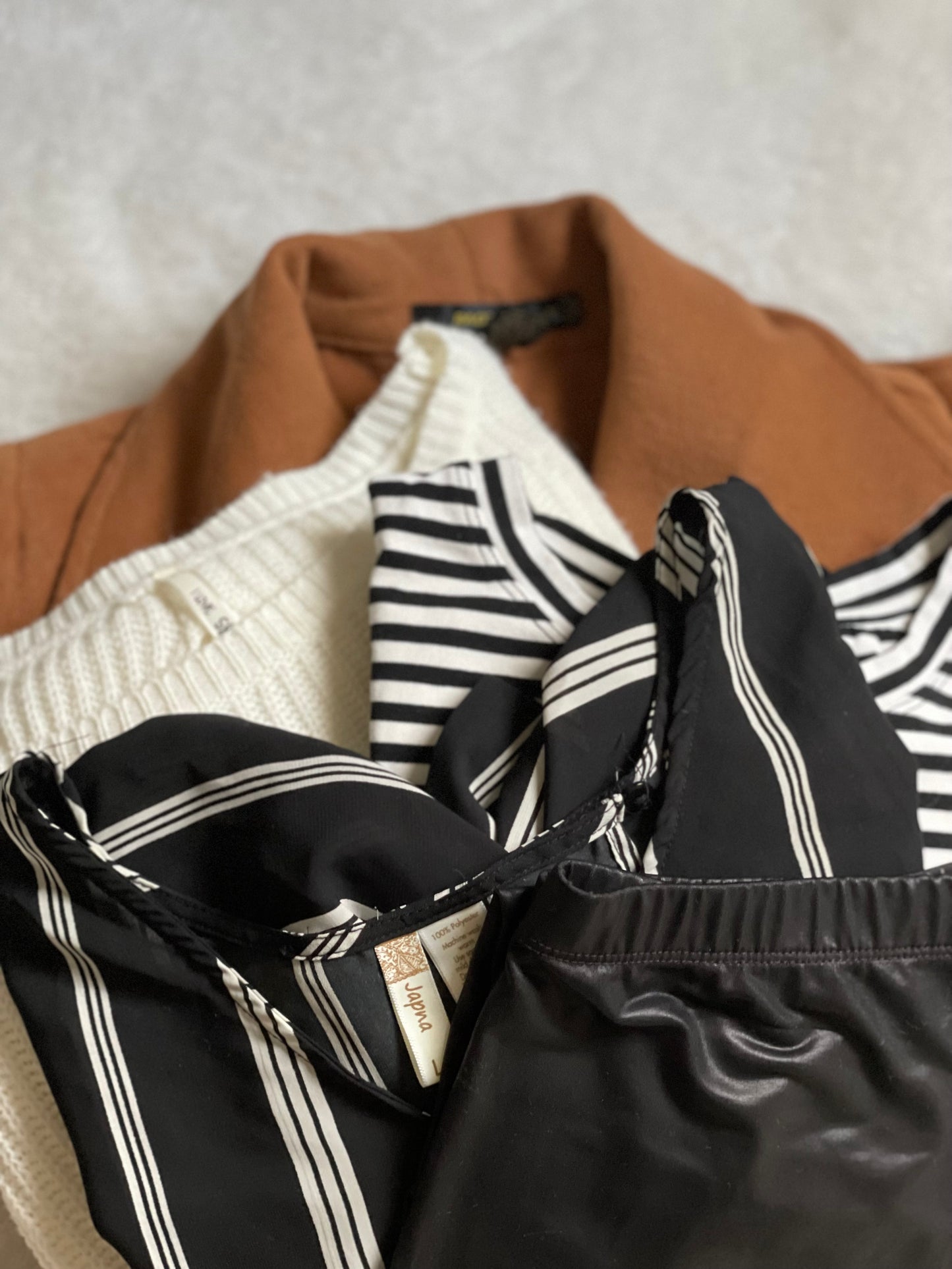 Curated Capsule. Black and Tan. Size medium. 5 items.