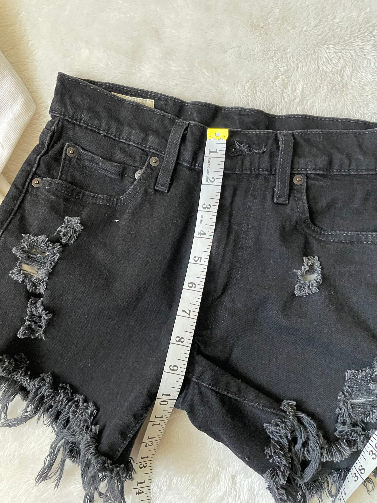 Levi’s Black upcycled 4" shorts. Size 32.